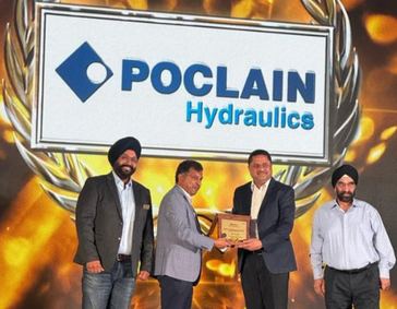 Picture of Poclain team receiving the Bull Machine Supplier award during the ceremony