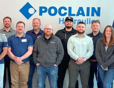 Picture of the group of Poclain experts and distributors