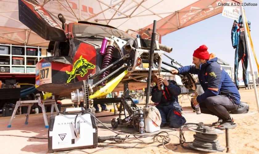 JLC Team fixing the buggy on the bivouac